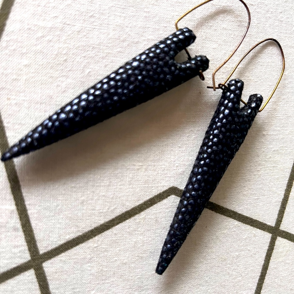 Lance leather wrapped earrings by Natalia Brilli Paris. Deep blue black.